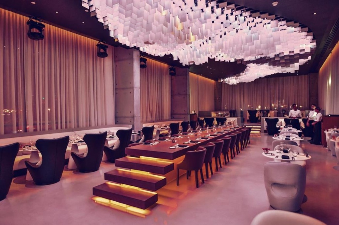 Contemporary restaurant interior with seamless floors and walls