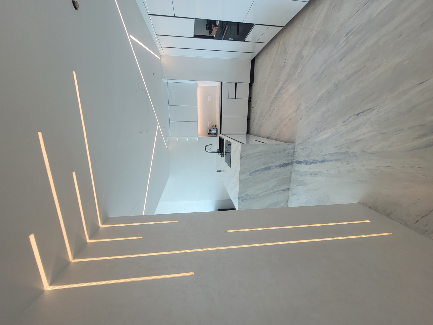 Private residence with seamless white mineral finishes